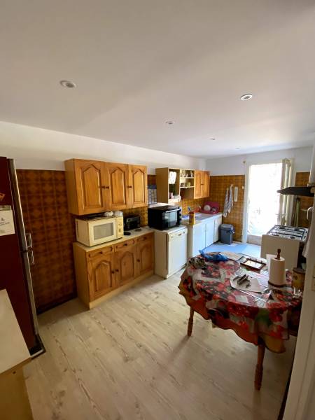 Rénovation d'un plafond de cuisine avec dépose de dalles PVC à Sainte-Foy-de-Peyrolières peintre Frouzins