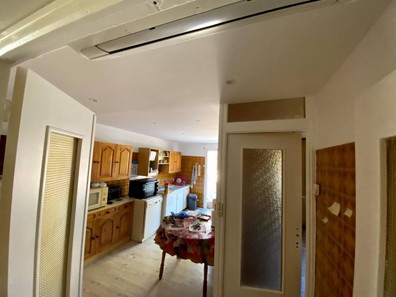 Rénovation d'un plafond de cuisine avec dépose de dalles PVC à Sainte-Foy-de-Peyrolières peintre Seysses
